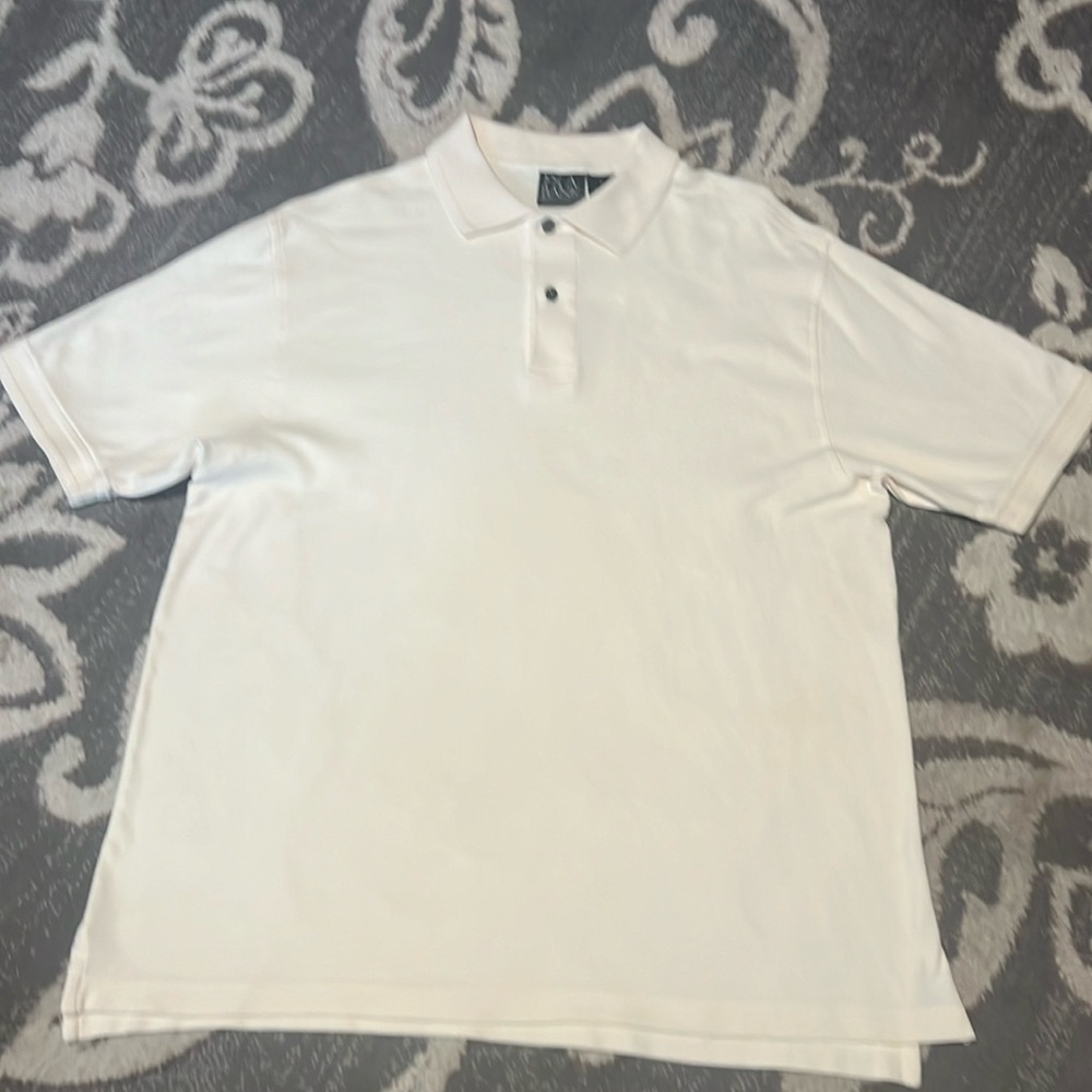 Jos. A. Bank travelers collection cream colored polo. NWOT. Size medium
